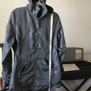 Women’s hooded windbreaker by MPG 100% polyester.